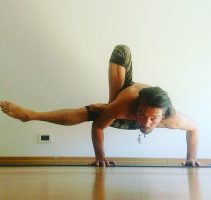PARSHVA BHUJA DANDASANA